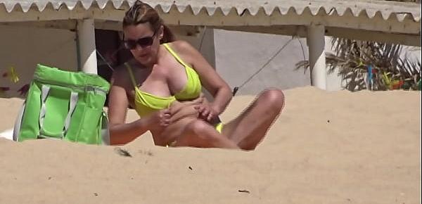  Lady with yellow bikini at the beach